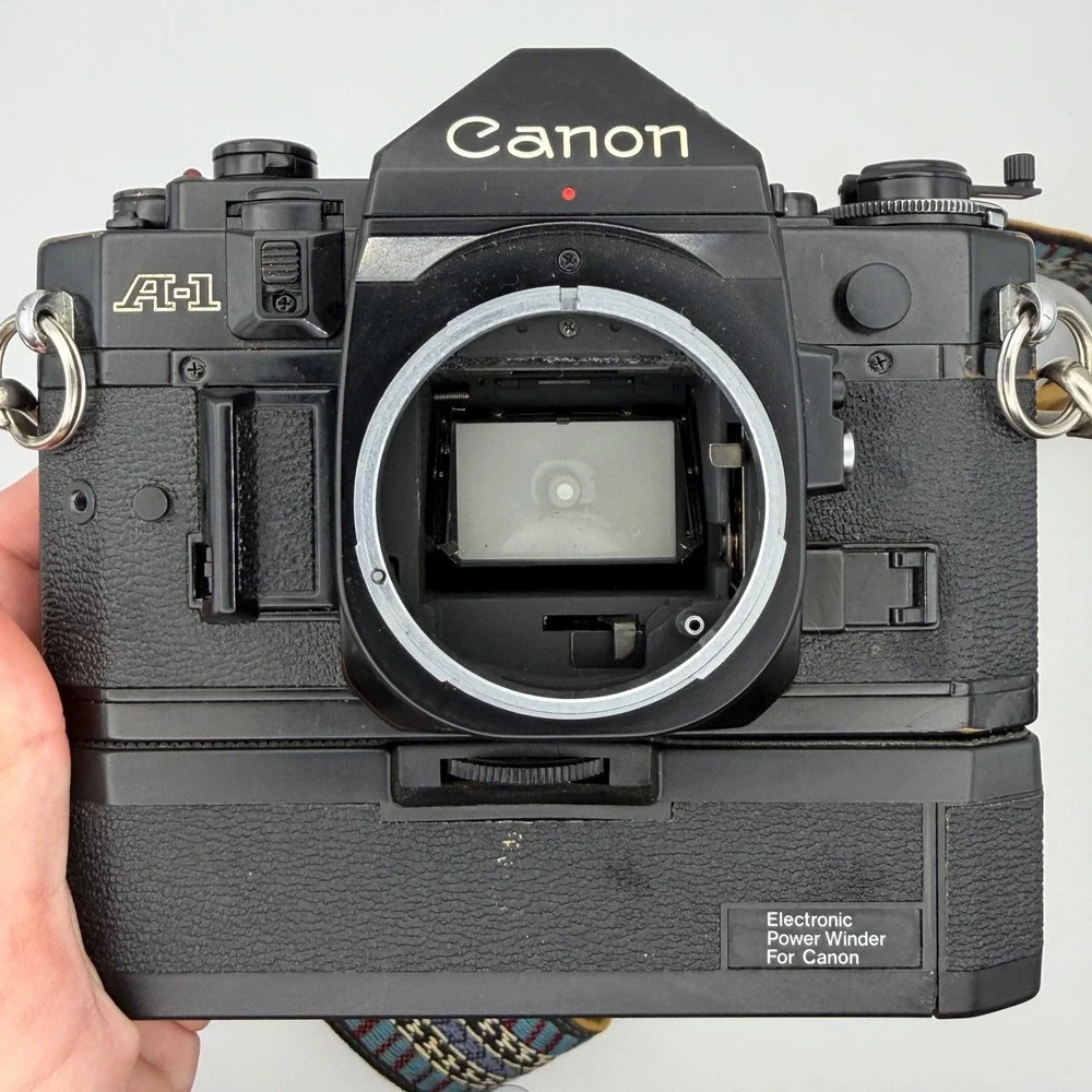 Canon A-1 35mm SLR‎ Film Camera Body w/ Power Winder Shutter Fires Untested